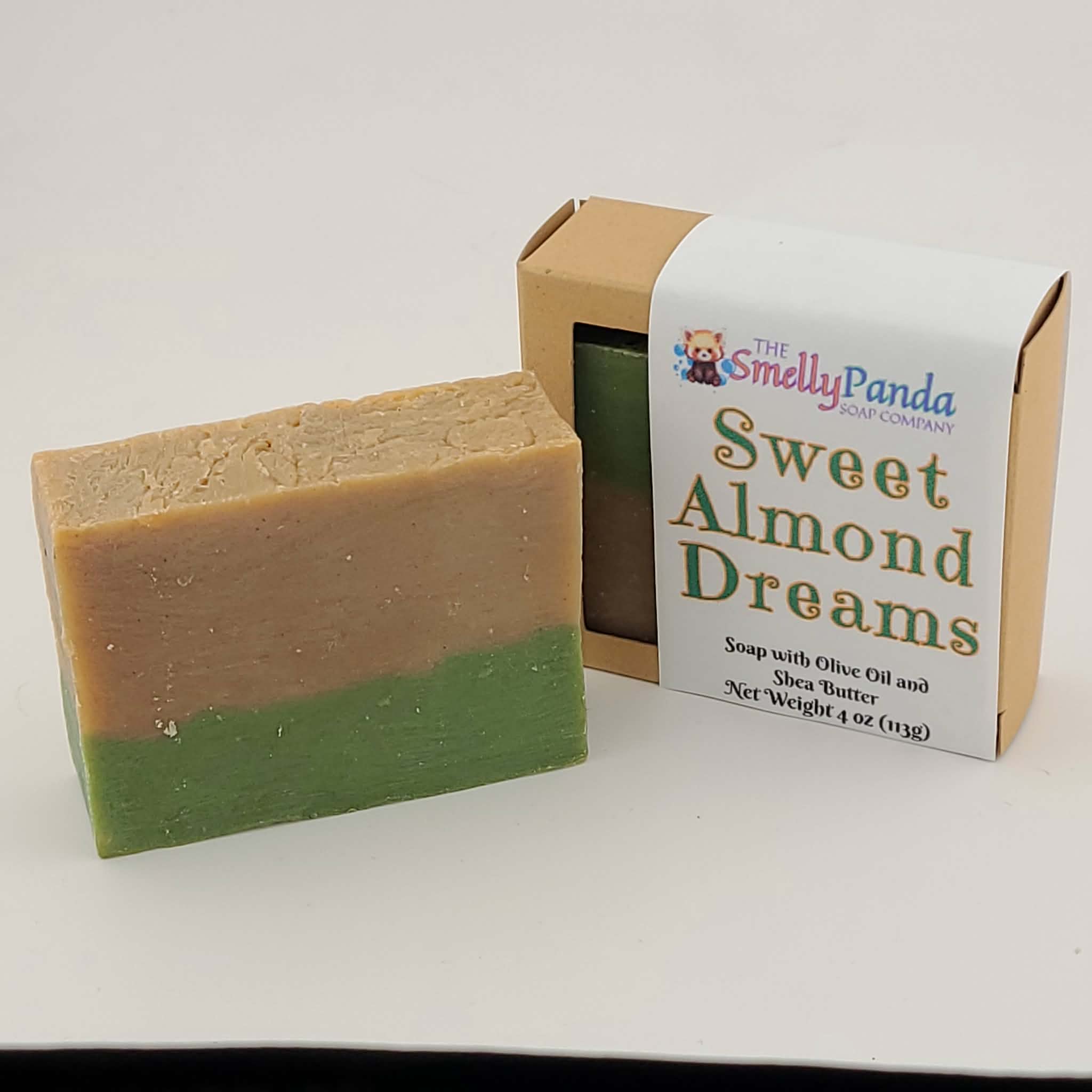 Two bars of soap, one green and one brown, with a Smelly Panda packaging on a white background.