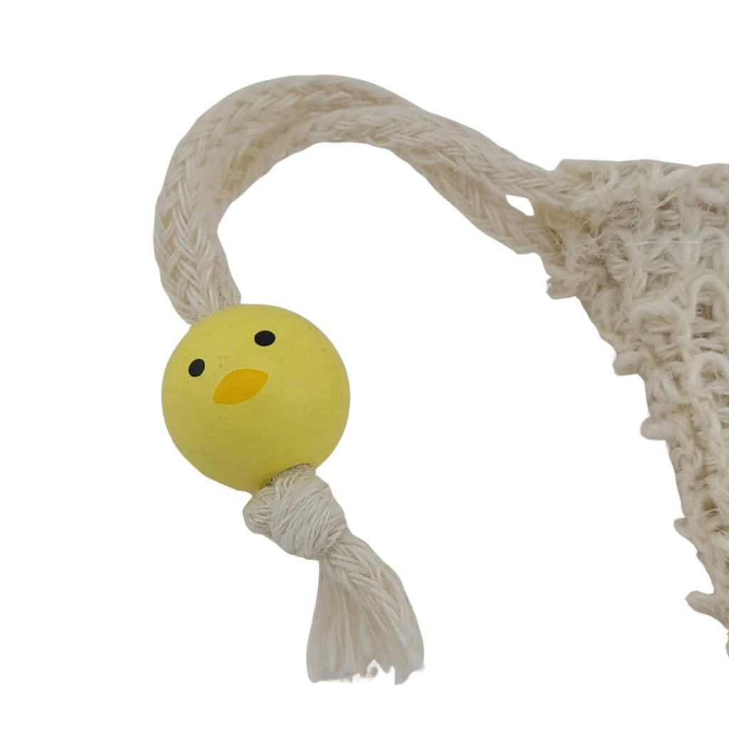 Yellow ball with a face and white rope on a white background